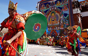 People attend religious service at Qoide Monastery in China's Tibet