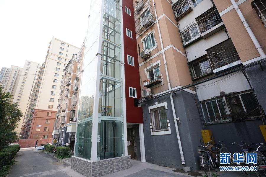 (新華全媒頭條·圖文互動)(3)88級臺階,終于不再是座“山”?——北京老舊小區加裝電梯現狀調查