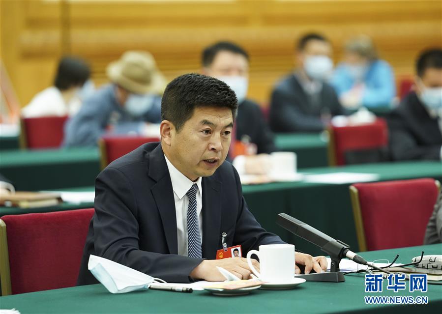 (新華全媒頭條·圖文互動)(5)從人民中汲取磅礴力量——習近平總書記同出席2020年全國兩會人大代表、政協委員共商國是紀實