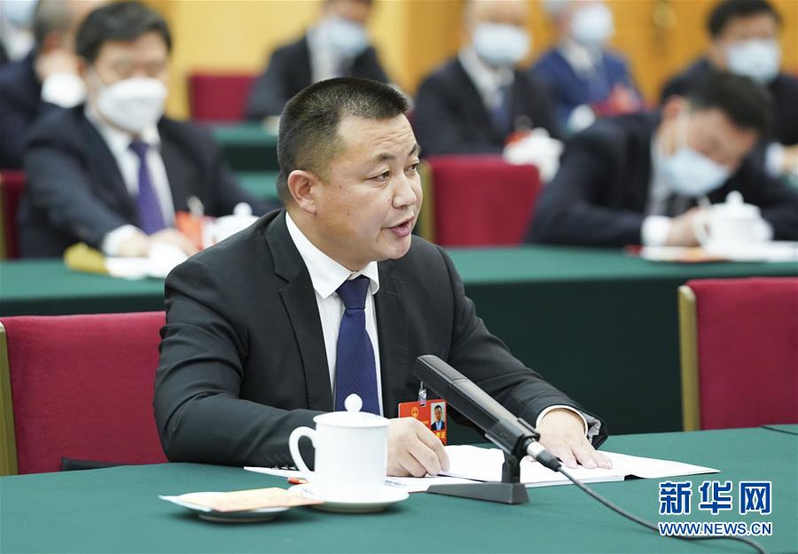 (新華全媒頭條·圖文互動)(11)從人民中汲取磅礴力量——習近平總書記同出席2020年全國兩會人大代表、政協委員共商國是紀實