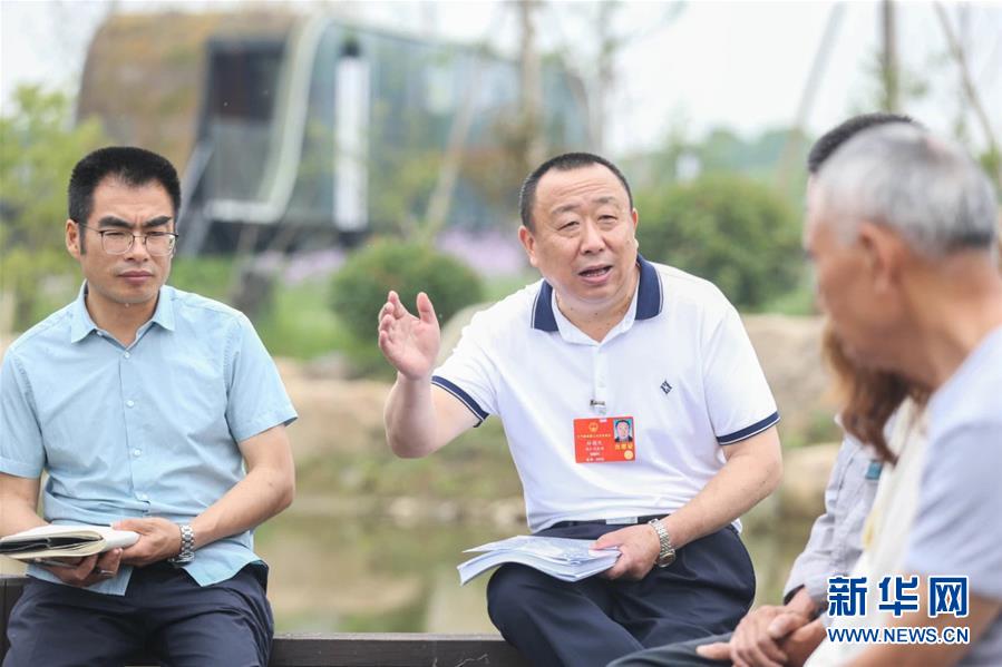 (新華全媒頭條·兩會精神看落實·圖文互動)(2)整體謀劃、系統升級、全面提升——落實全國兩會精神織牢織密公共衛生防護網