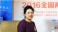 那輝:關注弱勢群體 幫扶下崗失業職工