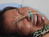 瓜農妻子受訪：城管打死人后拒絕救人