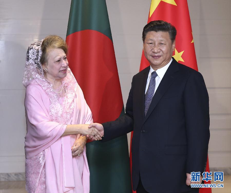 10月14日,國家主席習近平在達卡會見孟加拉國民族主義黨主席卡莉達·齊亞。  新華社記者龐興雷攝  10月14日,國家主席習近平在達卡會見孟加拉國民族主義黨主席卡莉達·齊亞。  新華社記者龐興雷攝