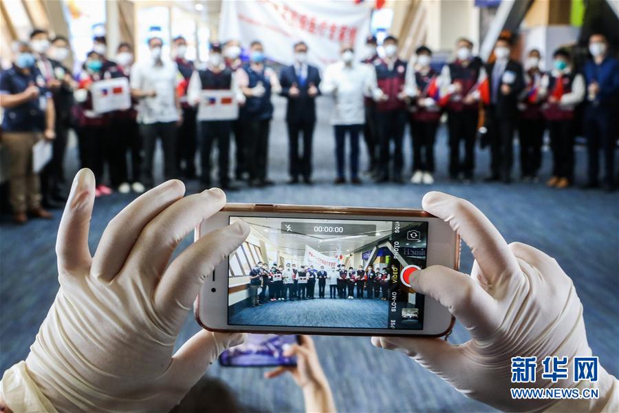 (國際疫情)(1)中國援菲律賓抗疫醫療專家組結束工作啟程回國