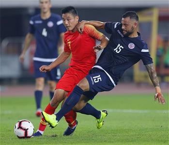 足球——世預賽:中國隊勝關島隊